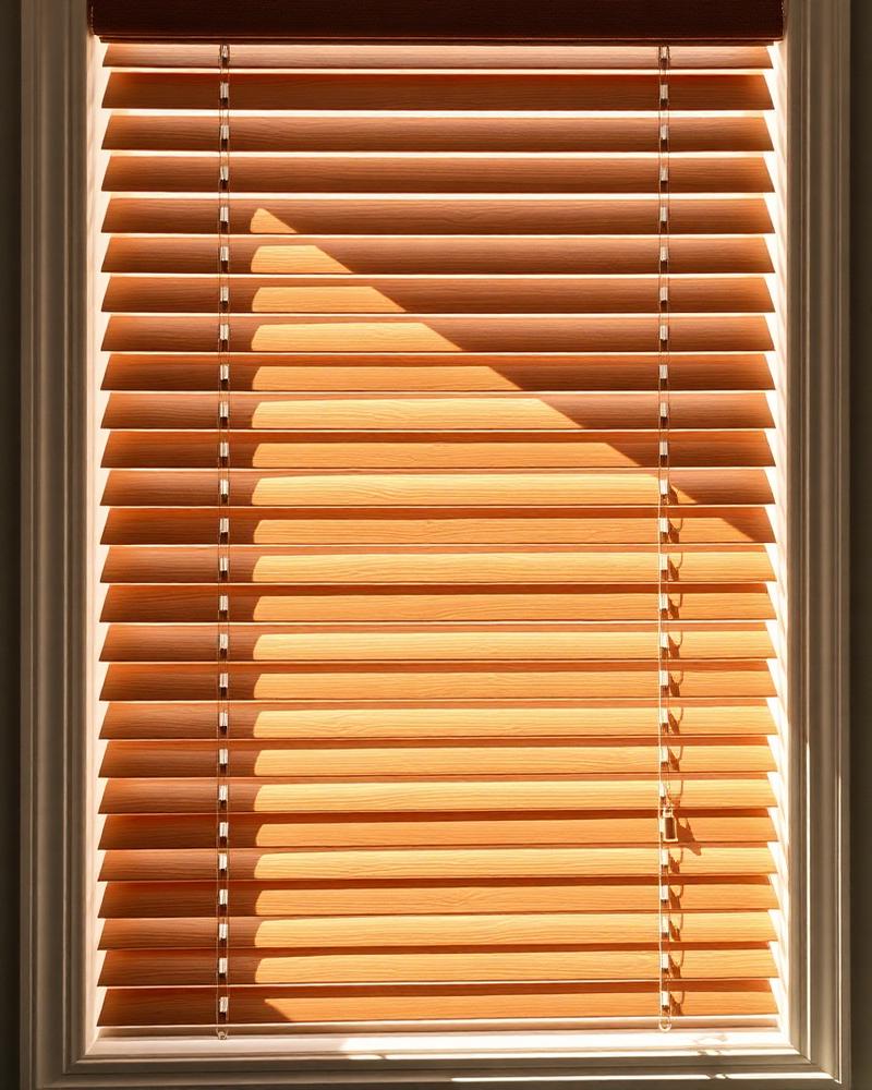 Parkland® Wood Blinds installed on a home window